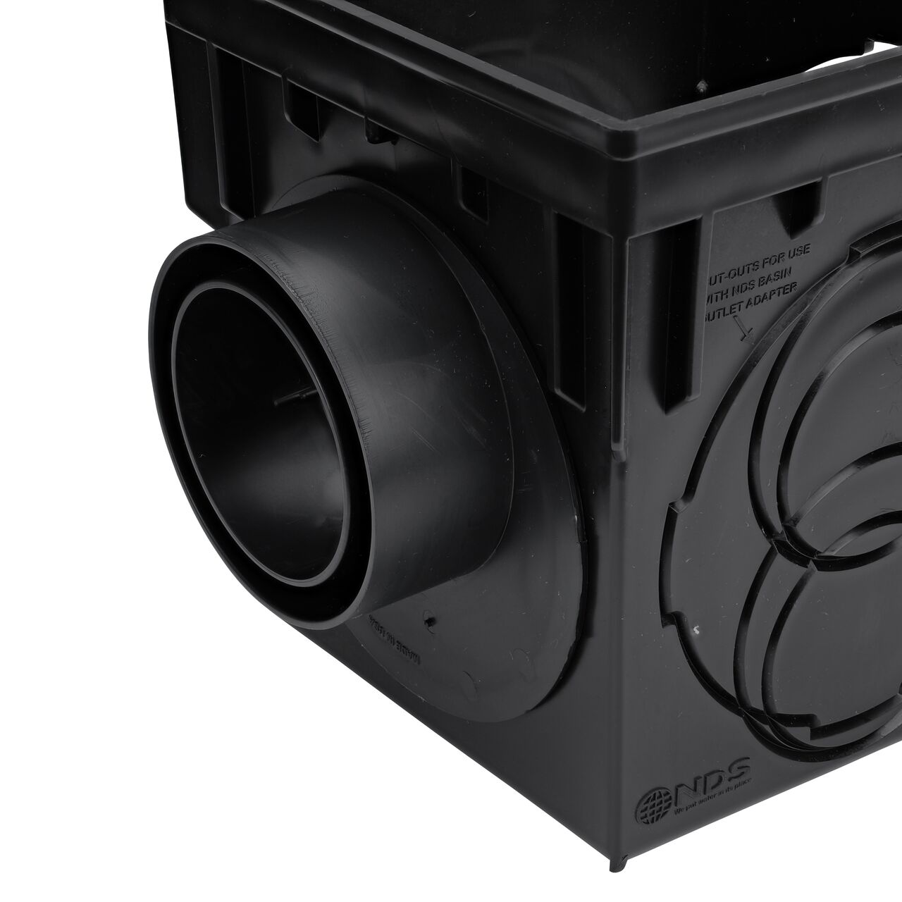 The NDS Offset Outlet Adapter (NDS 1245) installed on an NDS 9 in. Catch Basin Drain (NDS 900) with the offset/outlet in the top position