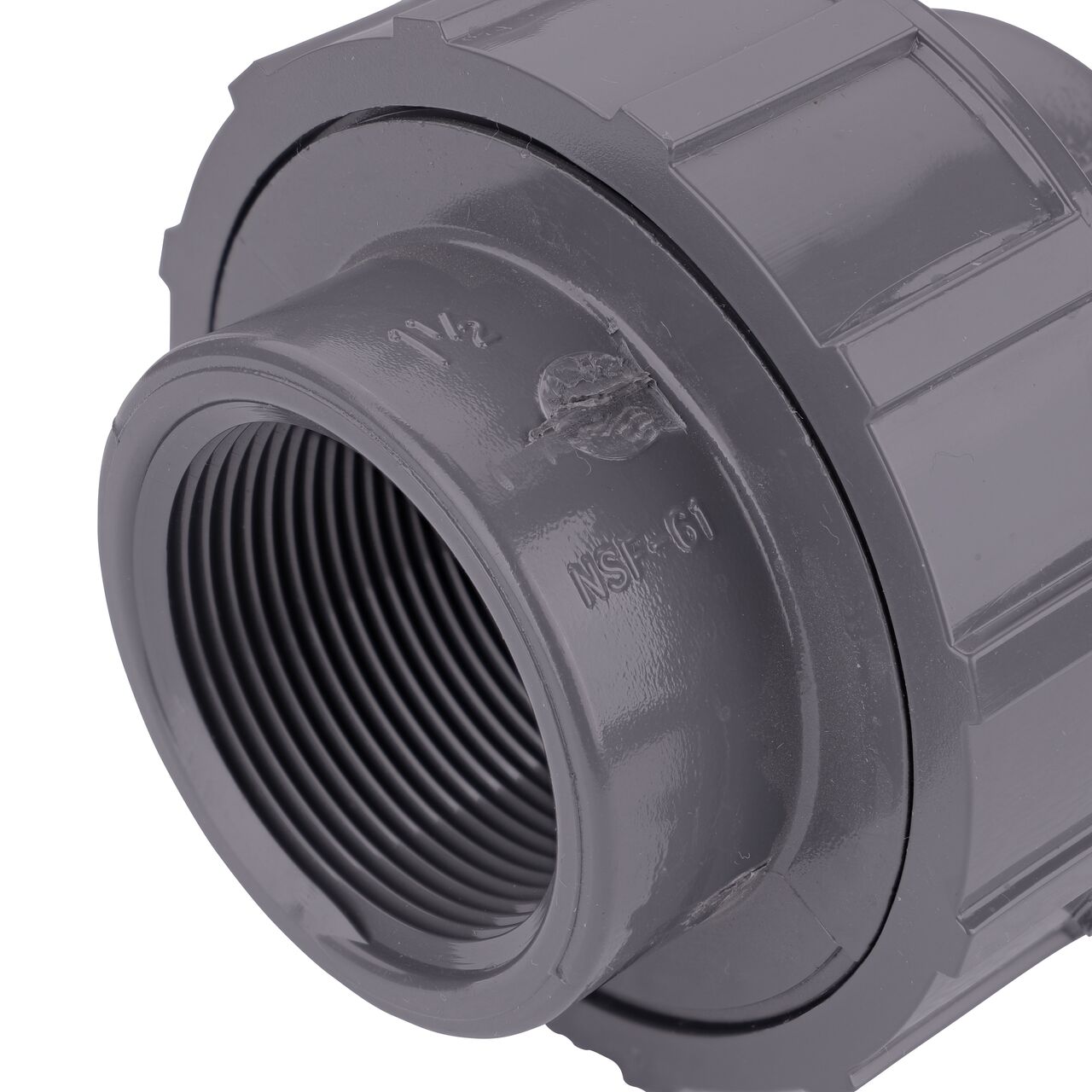 Closeup view of one threaded end on the NDS 1-1/2 in. PVC Union (NDS U-1500-T) which provides a corrosion-free connection between pipes and prevents costly property damage