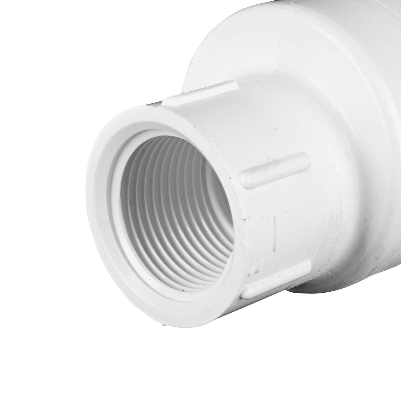 Closeup of the inlet end on the NDS White 1 in. female end by female end PVC Swing Check Valve (NDS 1520-10F) which prevents backflow in pipelines