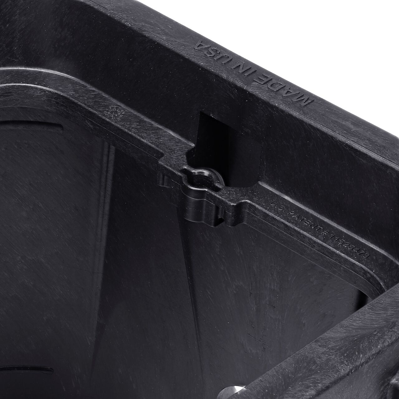 Closeup view of the universal locking mechanism on the black NDS 14 X 19 in. Rectangular Pro-Spec® Series Valve Box (NDS 313BCBR) for securing valve lid or cover to the valve box
