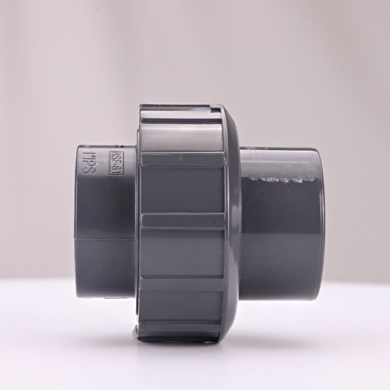 Side view of the NDS 1 in. PVC Union (NDS U-1000-S) shows both slip ends and a pull-apart feature to quickly disconnect from pipes