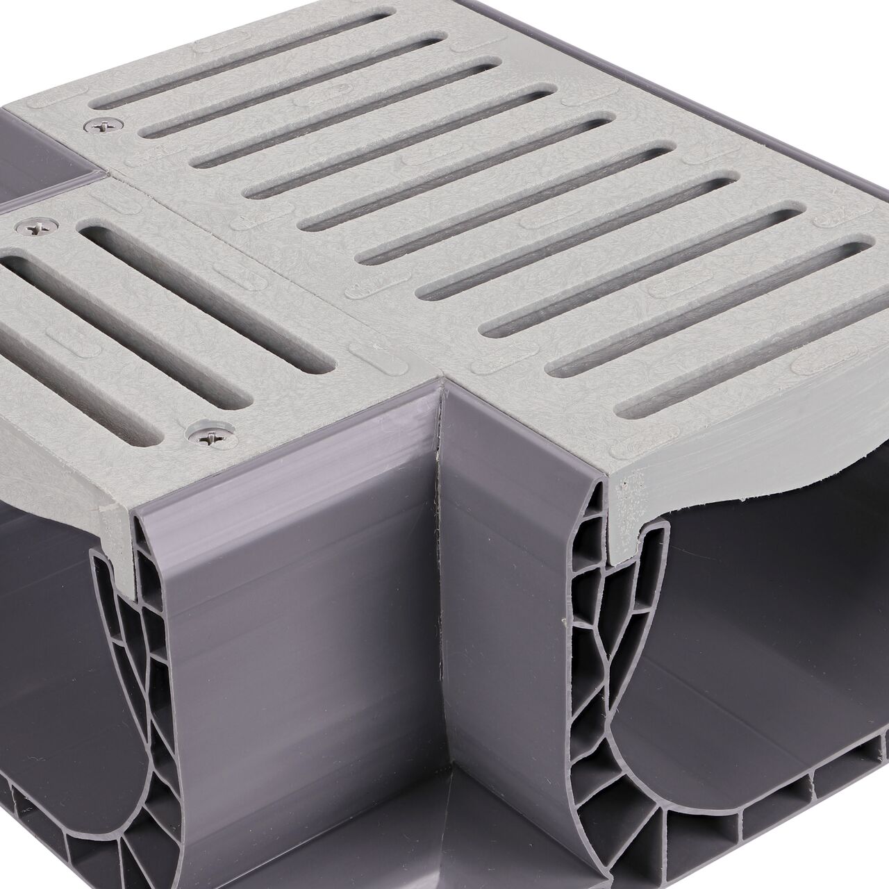 Closeup of the grate pattern of the NDS Gray Spee-D® Channel Drain Cross and Grate (NDS 2371)