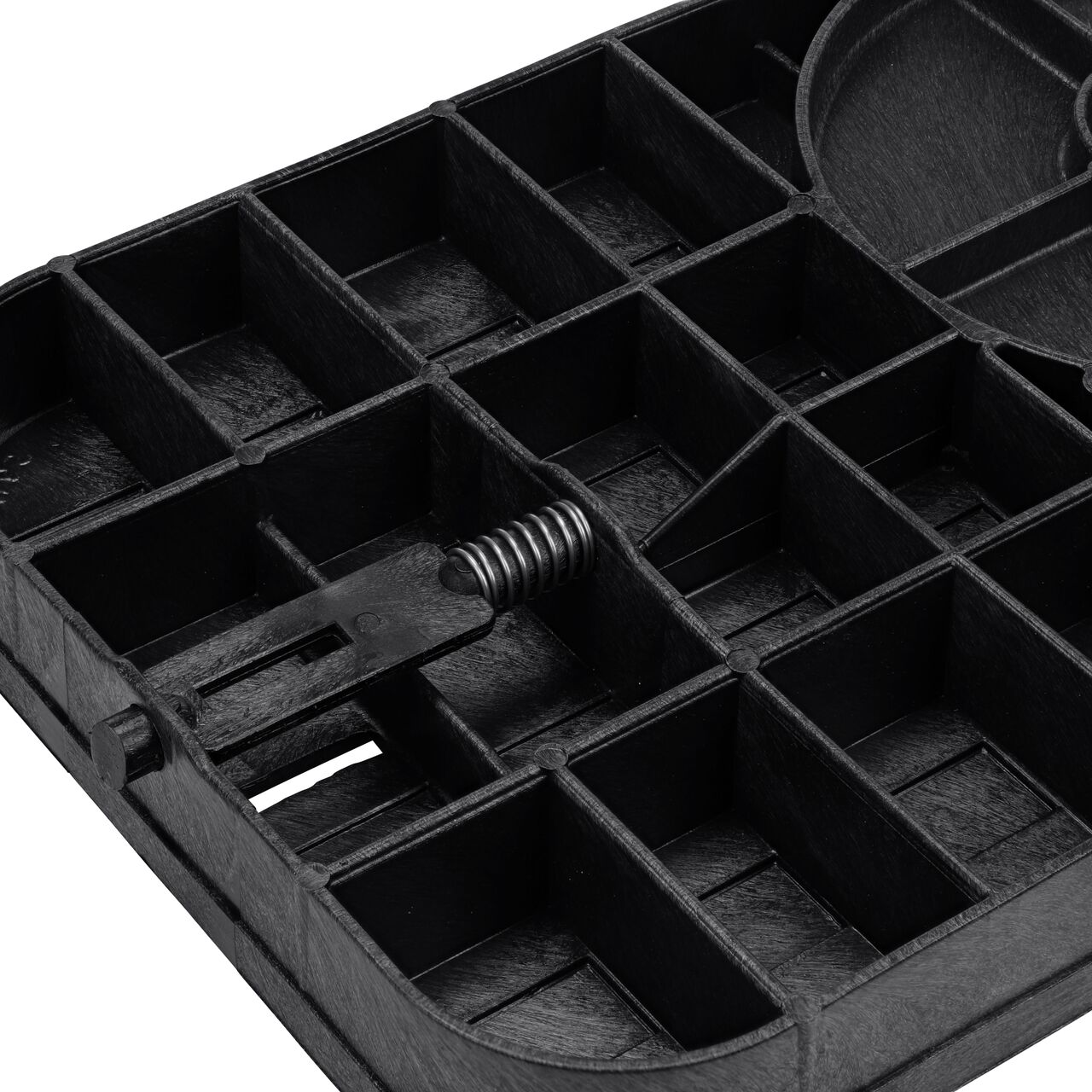 Closeup view of the locking mechanism on the NDS Black Drop-in AMR locking Water Meter Cover (NDS D12-TAMRL) with 2 in. Touch Reader Hole, 7 in. Recess