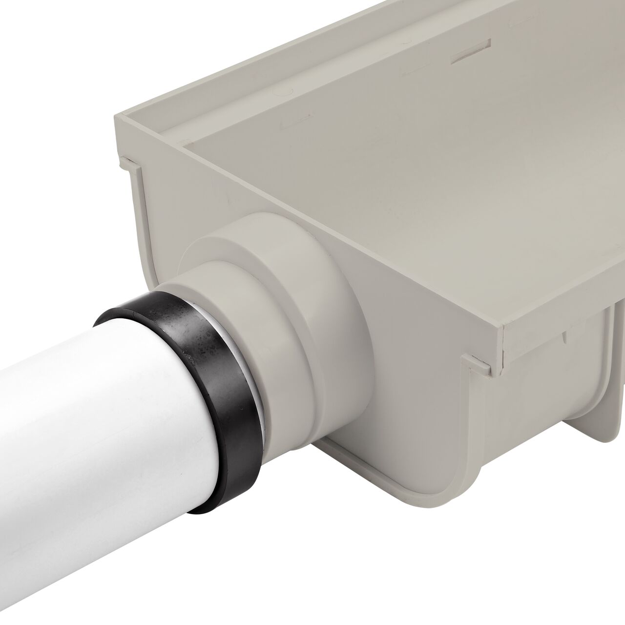 fully installed with NDS Light Gray 12 in. Pro Series Channel™ Drain End Cap/End Outlet (NDS 841) attached to channel drain and 4 in. pipe