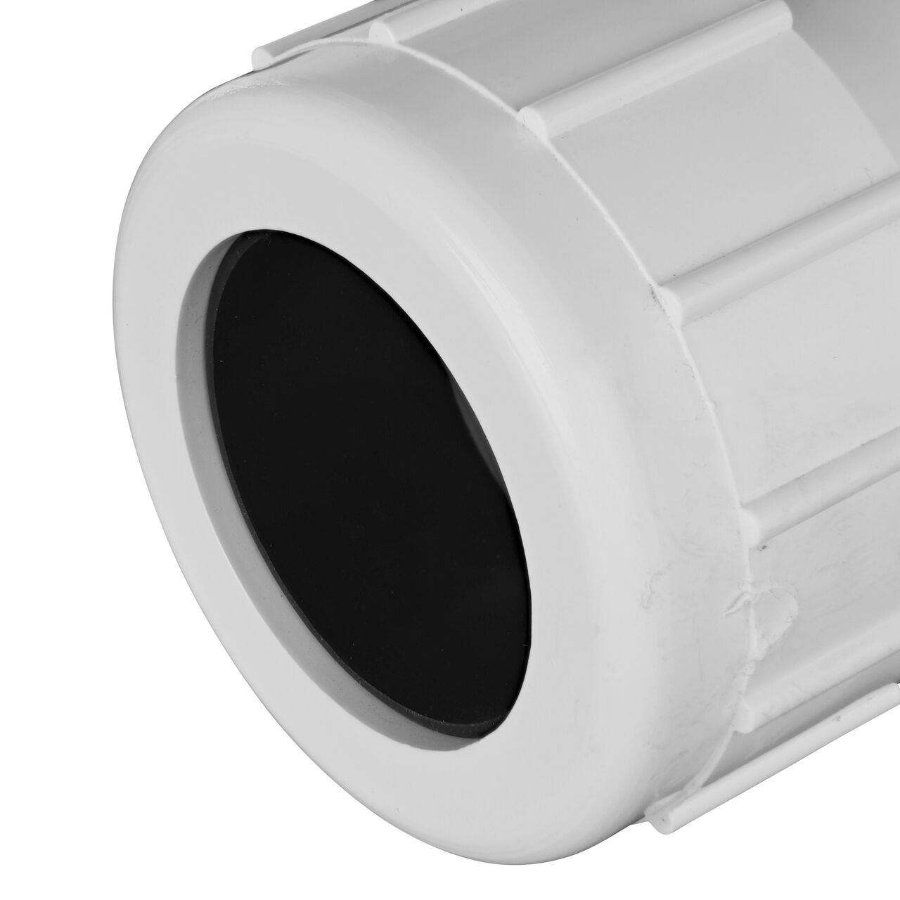 Closeup view of the NDS IPS UC Compression Coupling showing the 1-1/4 in. compression end with adjustable nut secured which reduces pull-out from pipe (NDS CPC-1250)