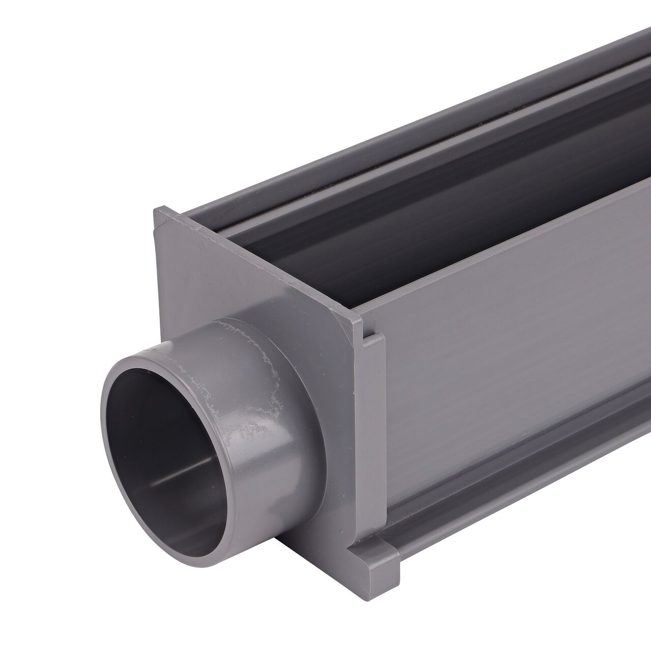 The NDS Gray Mini Channel™ Drain End Outlet (NDS 546) attached to mini channel drain without grate