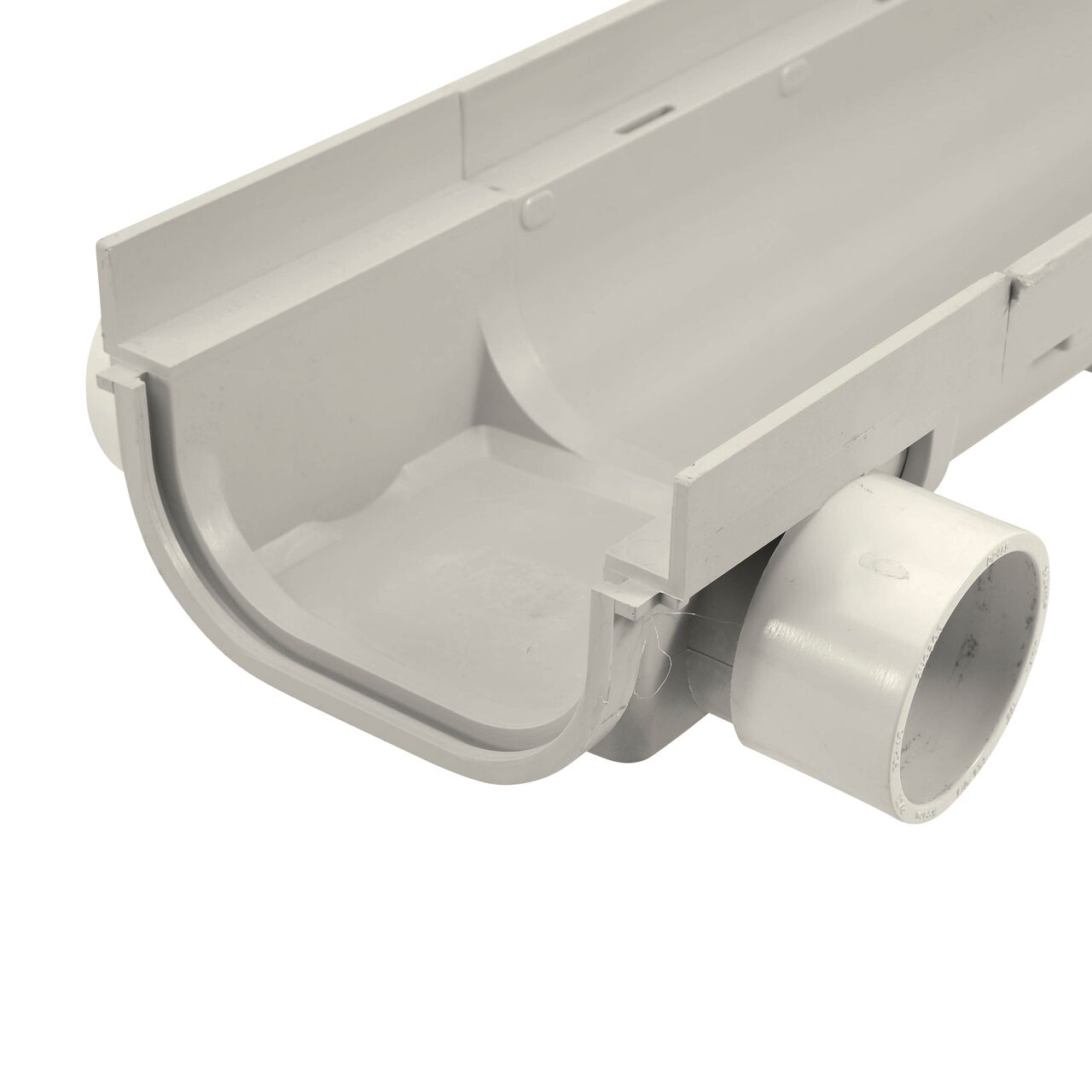 NDS 5 in. Pro Series Channel Drain, Bottom Outlet (NDS 822) attached to the end of the Shallow Profile Channel Drain (NDS 800)
