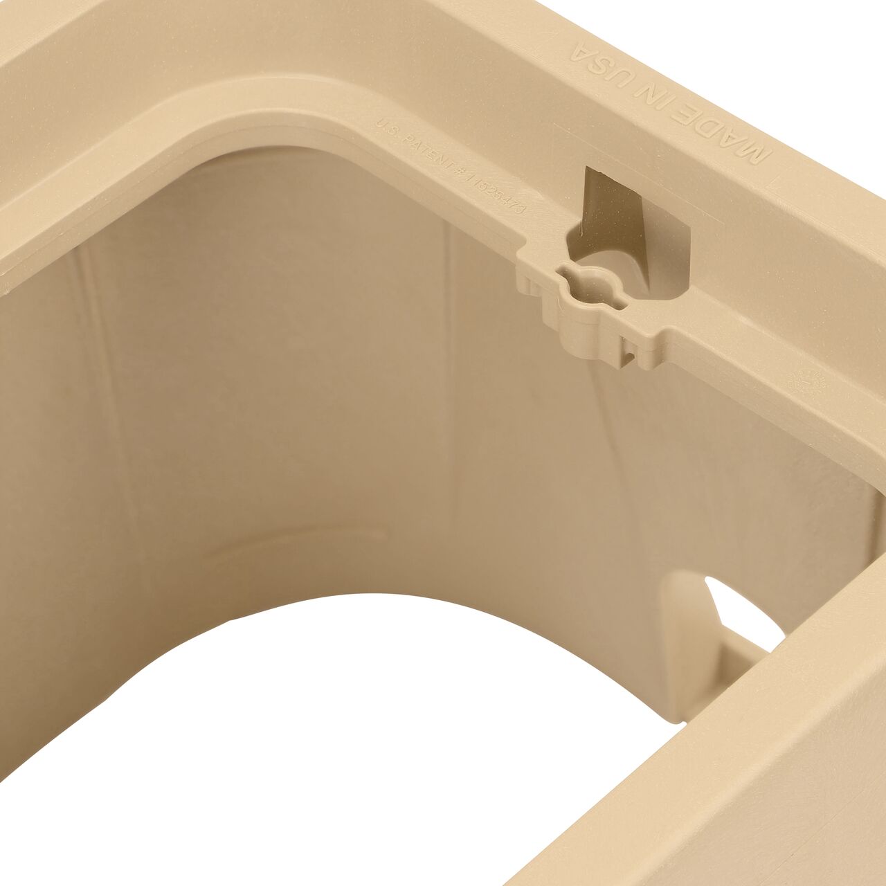 Closeup view of the universal locking mechanism hole on the Sand NDS 14 X 19 in. Rectangular Pro-Spec® Series Valve Box (NDS 314BCSAND) for securing valve lid or cover to the valve box