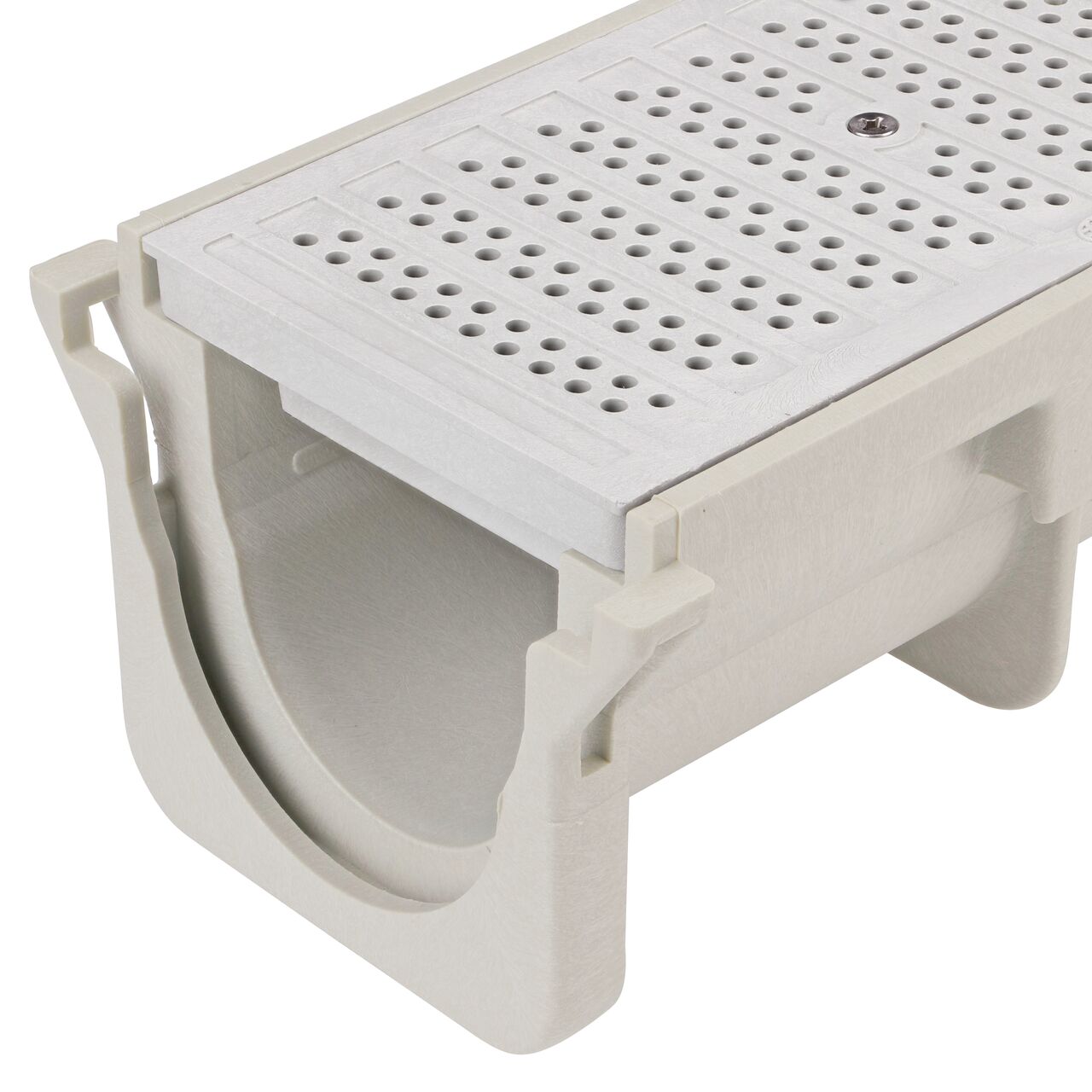 Closeup View of the light gray plastic Perforated Dura Slope™ Channel Drain Grate (NDS DS-670) installed on the Dura Slope Channel Drain (NDS DS-091)