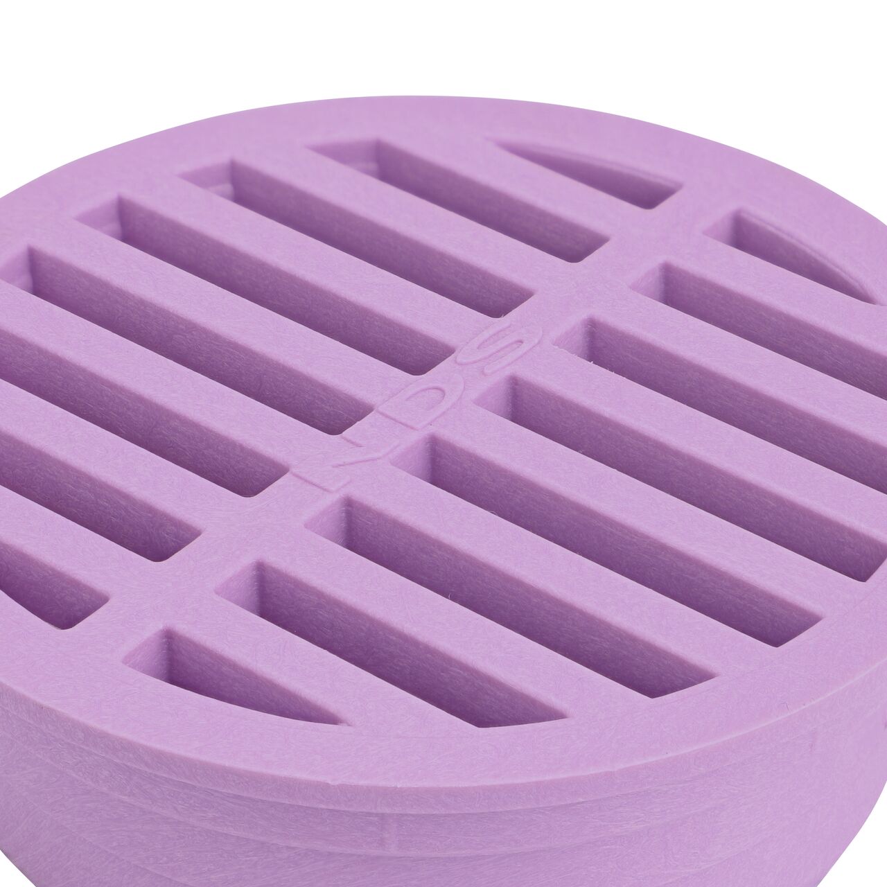 Closeup of the grate pattern on the NDS 4 in. Round Grate (NDS 13P)