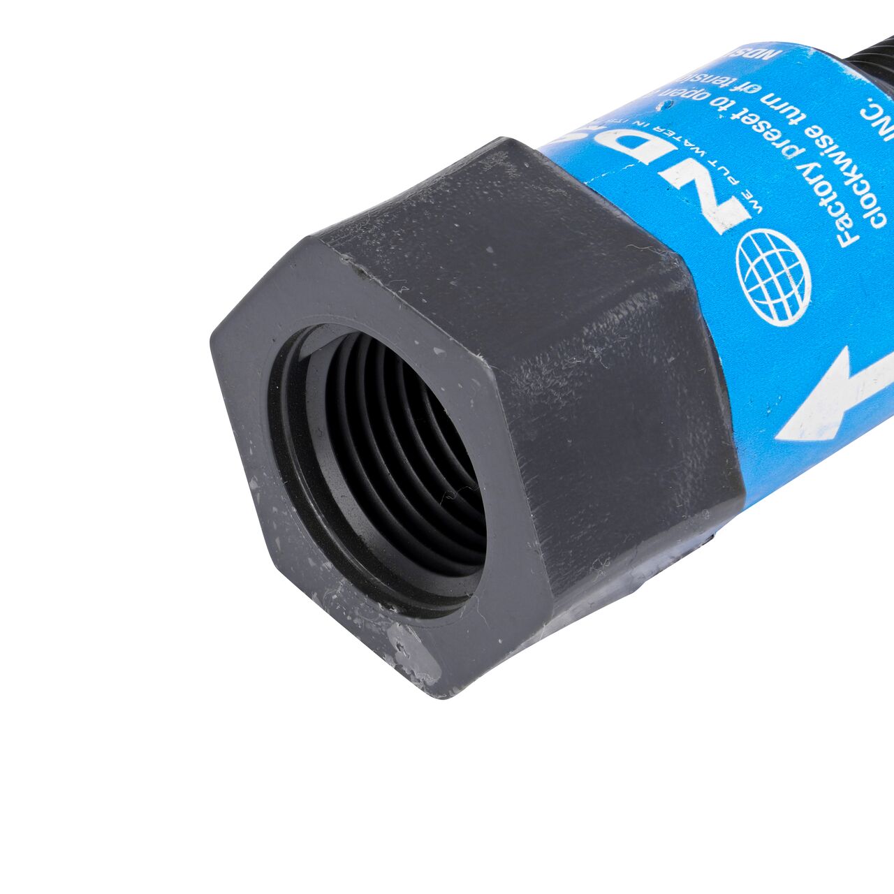 Closeup of the FPT end of the NDS Gray 1/2 in. IPS MPT X FPT PVC Adjustable Inline Spring Check Valve (NDS CV-0500-MF)