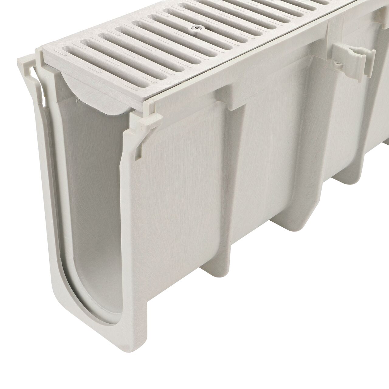 Closeup groove (female) side of the NDS 11.39 in. Deep Neutral Dura Slope Channel Drain (NDS DS-112N) with the Standard Duraslope Light Gray Grate installed (NDS 661LG)