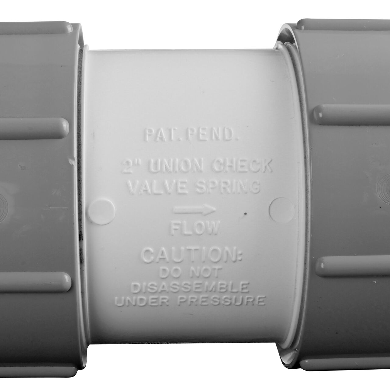 Closeup of the directional arrow on the NDS 2 in. IPS slip by slip PVC Compact True Union Spring Check Valve (NDS 1790-20)