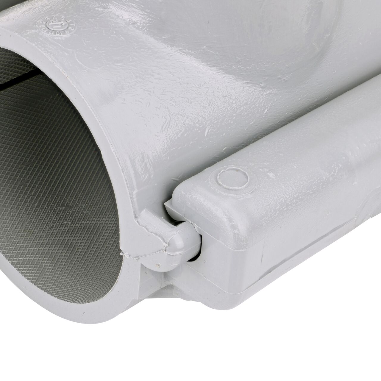 Closeup of the hinge closed on the NDS Clamp-It™ Rigid PVC Saddle with 1-1/2 in. FPT connection on top (NDS 422015) for 2 in. PVC pipe