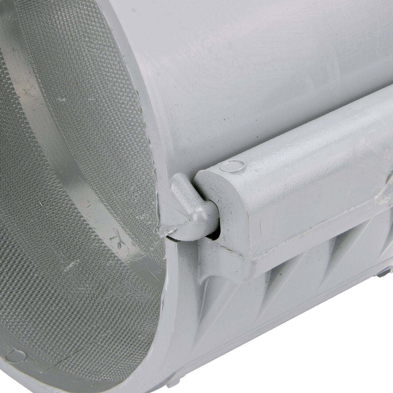Closeup of the hinge closed on the NDS Clamp-It™ Rigid PVC Saddle with 1-1/2 in. slip connection on top (NDS  456015) for 6 in. PVC pipe