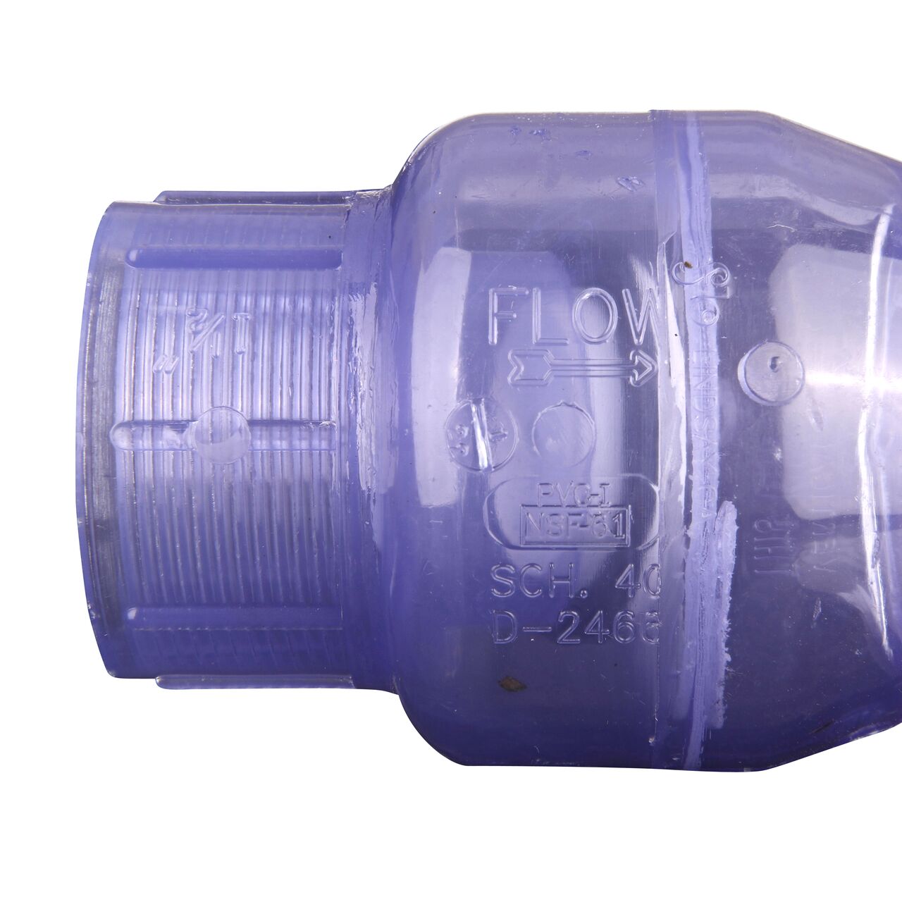 Closeup of the arrow showing water flow direction on the NDS Clear 1-1/2 in. female end by female end PVC Swing Check Valve (NDS 1520C15F)