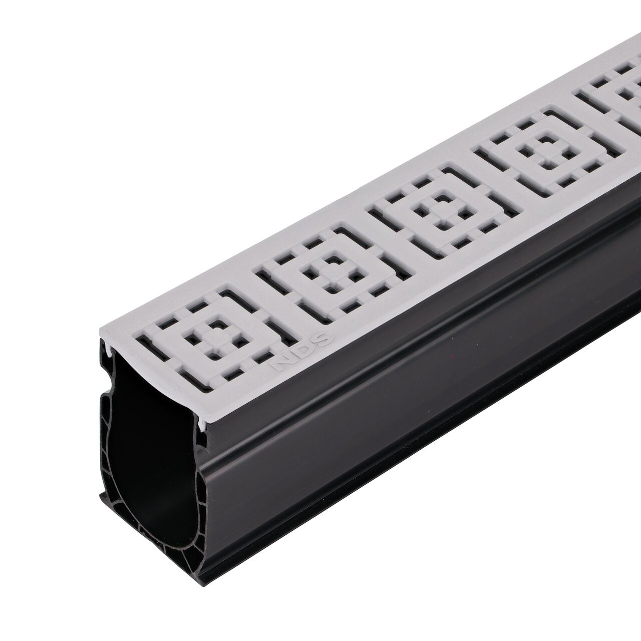Closeup end of the Slim Channel™ Gray Decorative Square Design Drain Grate (NDS 9253) installed on a Slim Channel™ Drain
