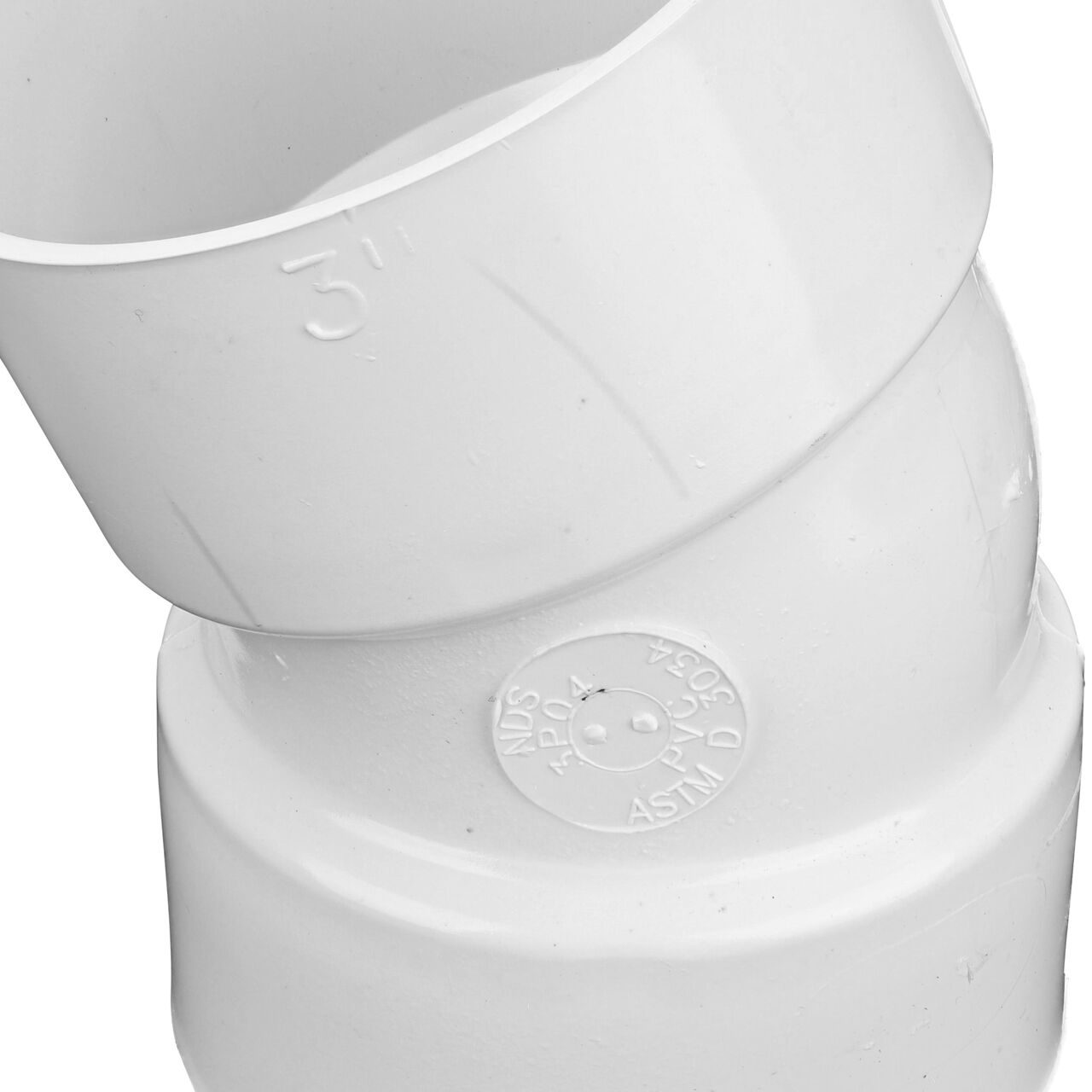 Closeup of wording of the PVC 22.5° elbow, connects 3 in. Sewer and Drain pipes, Hub X Hub connection (NDS 3P04)