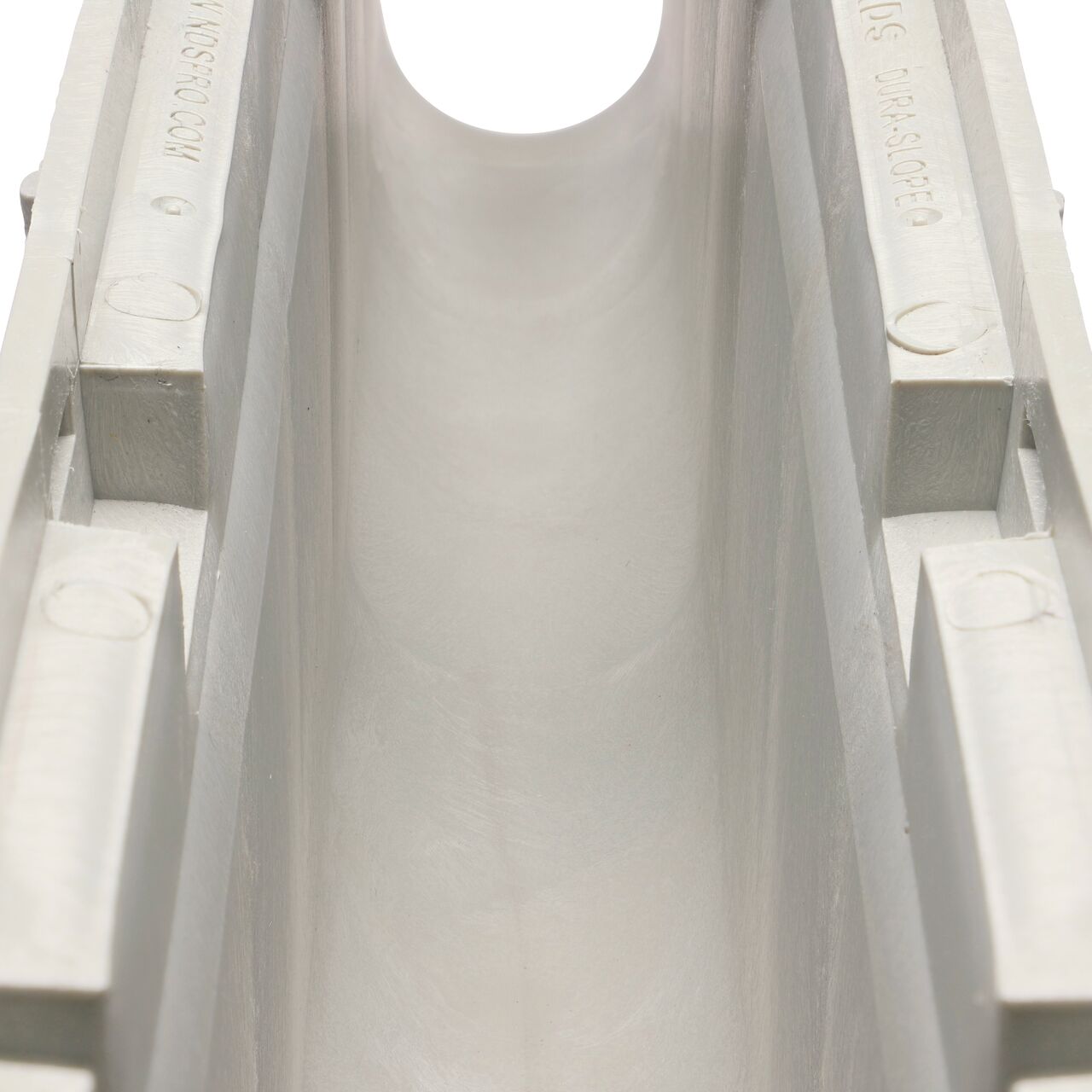 Closeup view of the grooved interior on the NDS Dura Slope Channel Drain, which supports and secures grates with the grate locking system (NDS DS-112N, NDS DS-113, NDS DS-114)