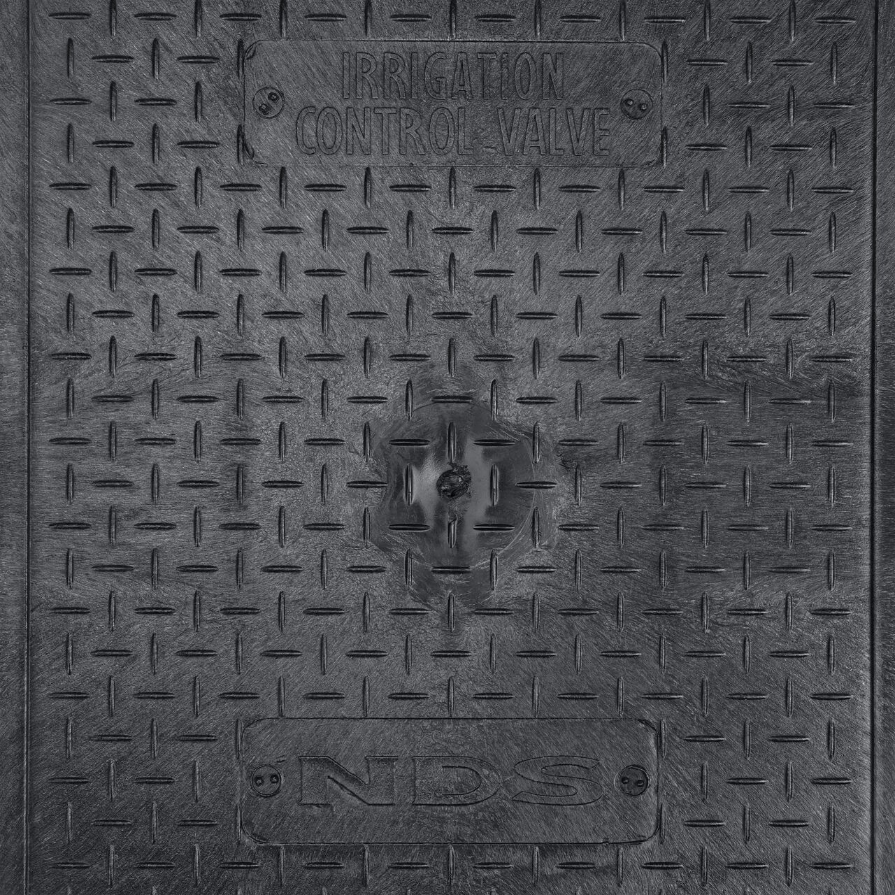 Closeup view of the NDS logo and Irrigation Control Valve markings on the Black Irrigation Control Valve cover for the NDS 14 in. X 19 in. Rectangular Standard Series Valve Box (NDS 113BCBLK)