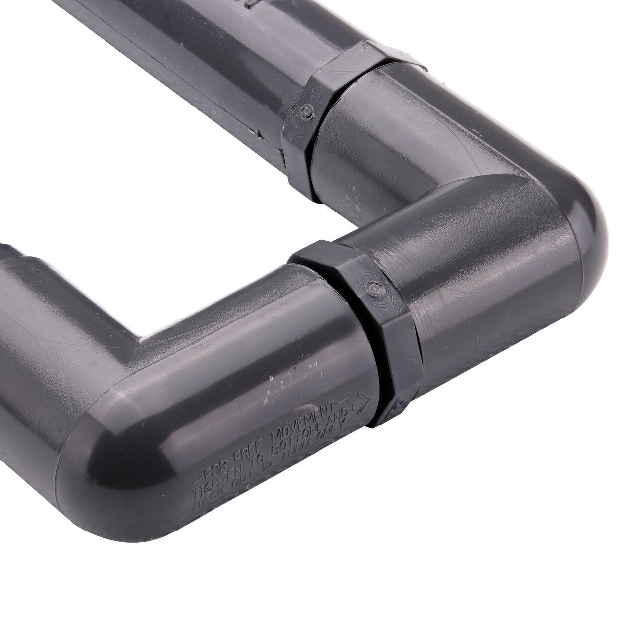 Closeup view of the NDS PVC Triple Swing Joints Assembly, Sch. 80 1/2 in. spigot X 1/2 in. MPT shows a rotating elbow that is ideal for placing sprinklers in narrow or uneven areas that the pipeline can’t reach (NDS TSA-0500-ST)