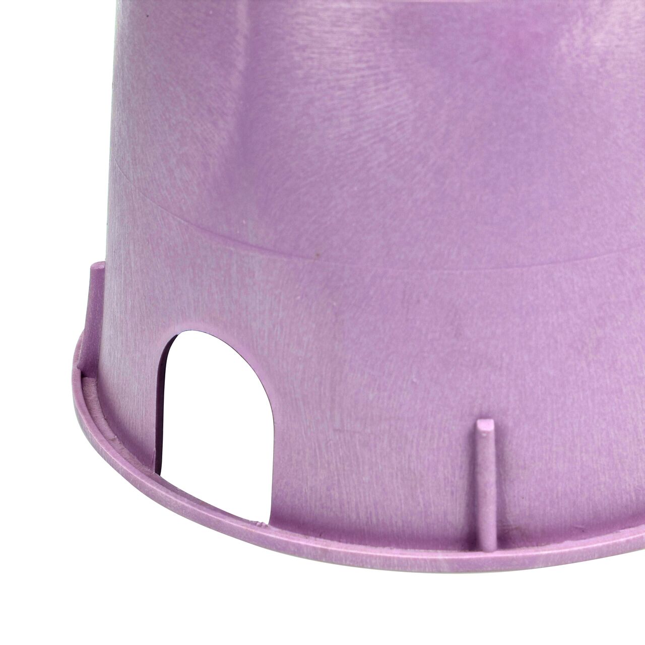 Closeup of the 10 in. Round Valve Box PVC pipe hole; allows irrigation pipe entry into box interior (NDS 111PBCR)