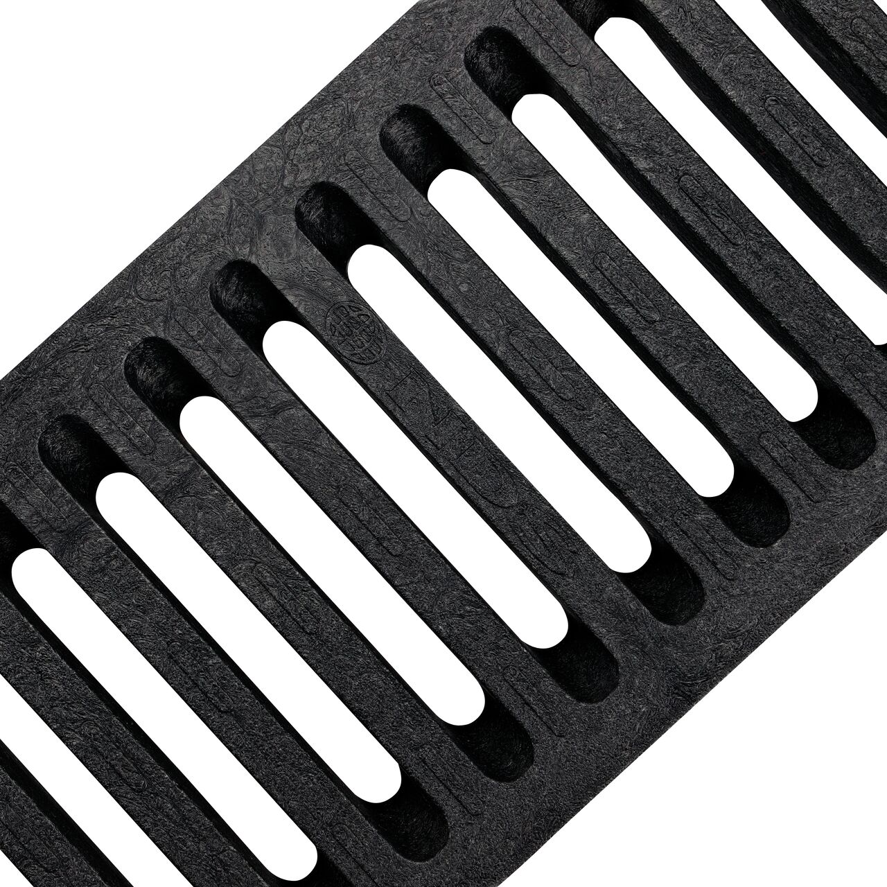 Angled View of the sand plastic Dura Slope™ Channel Drain Grate (NDS 664) perforated design