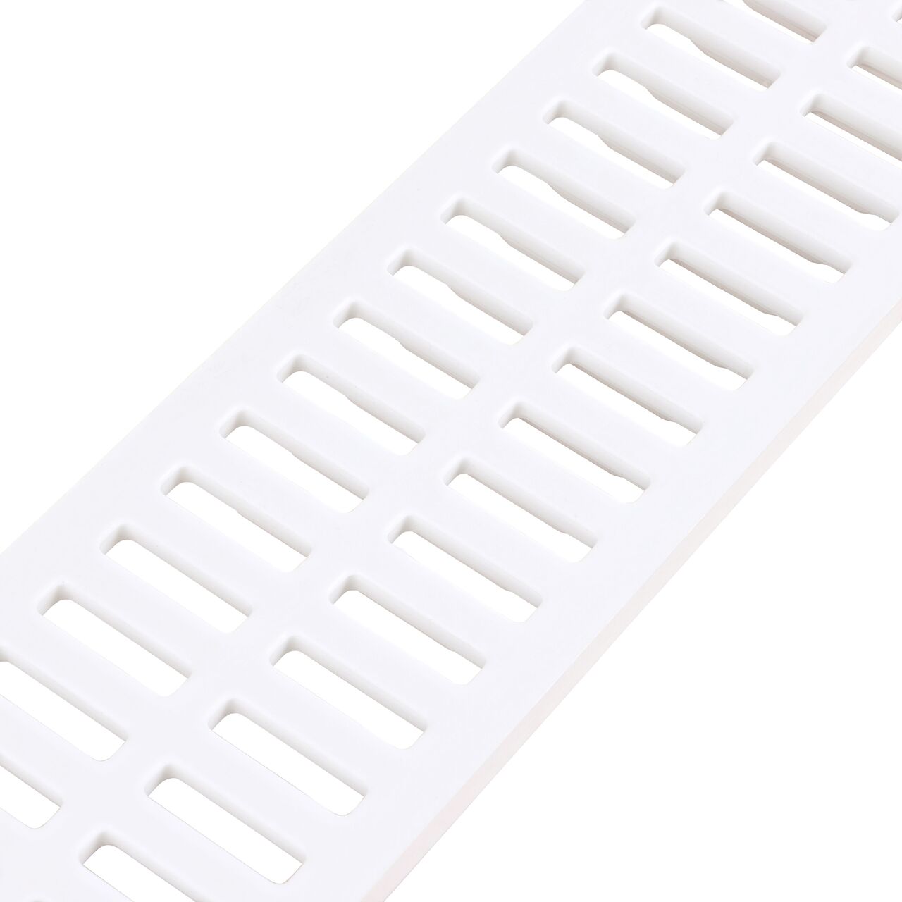 Closeup angled view of the White Plastic Mini Channel™ Drain Grate (NDS 540)