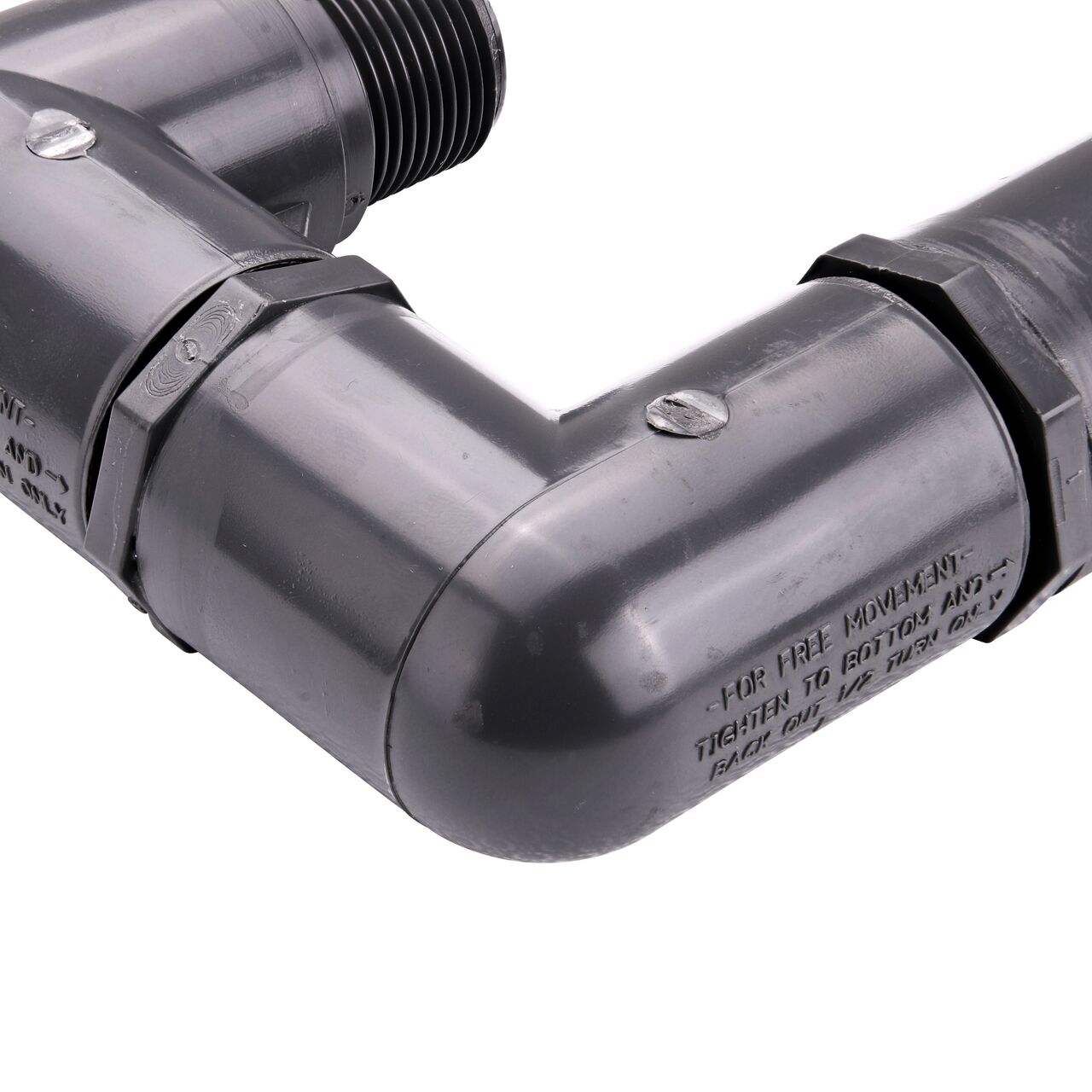 Closeup view of the NDS PVC Triple Swing Joints Assembly, Sch. 80 1 in. spigot X 1 in. MPT showing the flow direction and sprinkler can easily be repositioned after installation if needed (NDS TSA-1000-ST)