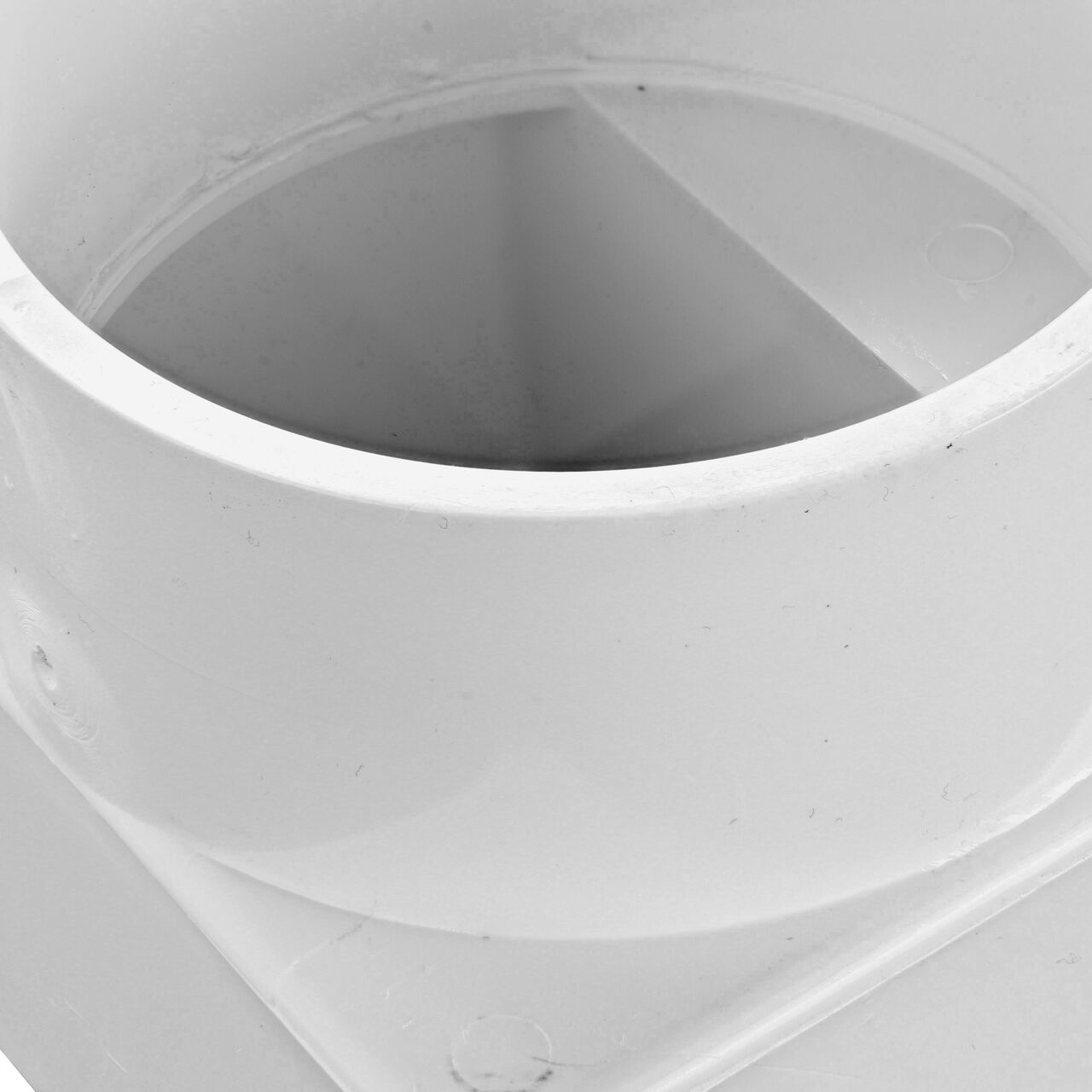 Closeup of the 2X3 in. Downspout connection on the PVC offset downspout adapter (NDS 9P03)