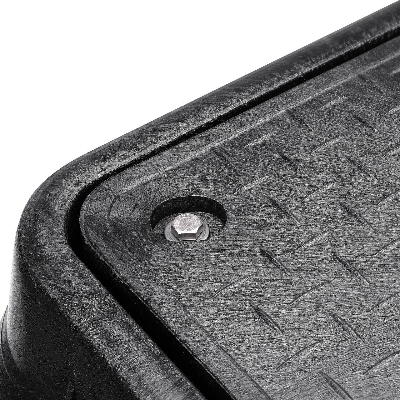 The valve box lid securely in place on the NDS 17 in. X 30 in. Rectangular Standard Series Black Box and Black Water Meter Cover with Bolt (NDS 124BCDMB) keeping components protected against the elements, foot traffic, lawn care equipment, and potential vandalism while keeping them out of sight