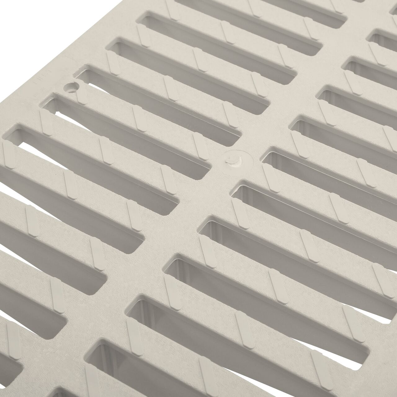 Close-up of grate openings on 12 in. Pro Series Channel Drain Grate in Gray Plastic (SKU 847)