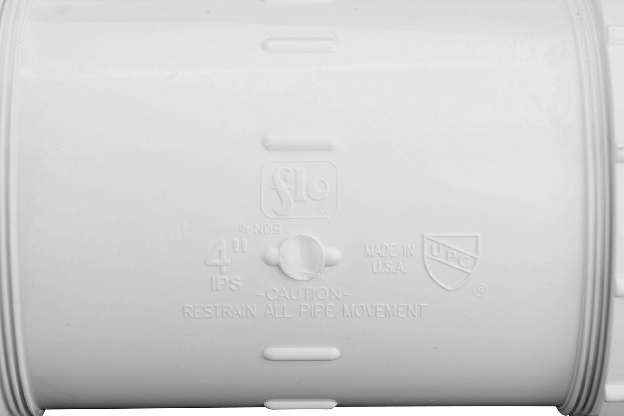 Closeup view of the NDS 4 in. IPS UC Compression Coupling showing that it is made in the USA as part of a complete flow management system for pool, spa, irrigation, and plumbing applications (NDS CPC-4000)