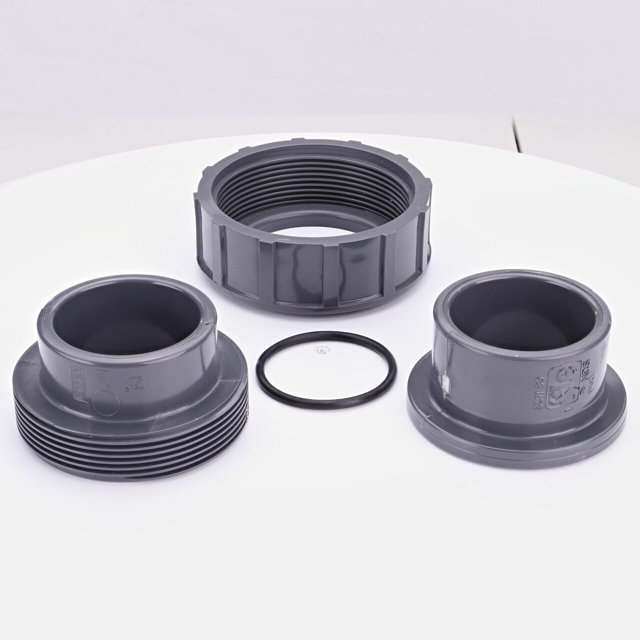 The NDS 1-1/2 in. PVC Union shown here unassembled, includes the EPDM O-ring that is placed in the center of the union to create a leak-resistant seal (NDS U-1500-S)