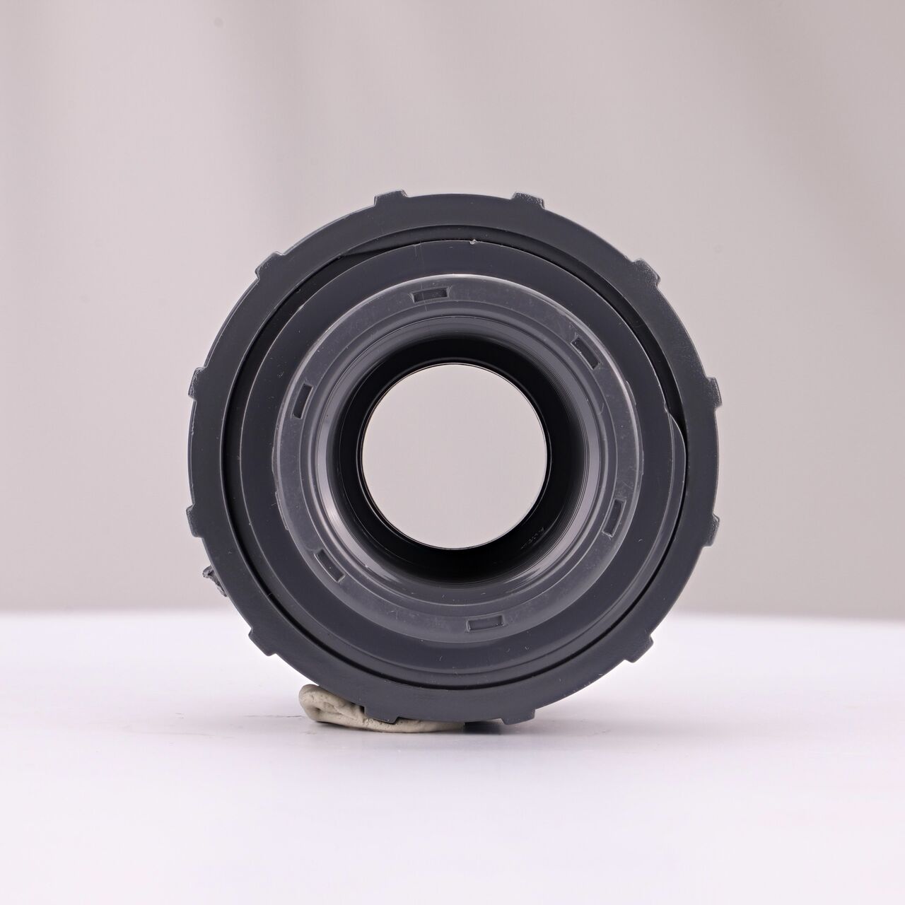 The inside of the PVC Union, 1 in. Sch. 80 S X FPT which allows water to flow through while preventing leaks and made of durable PVC plastic (NDS U-1000-ST)