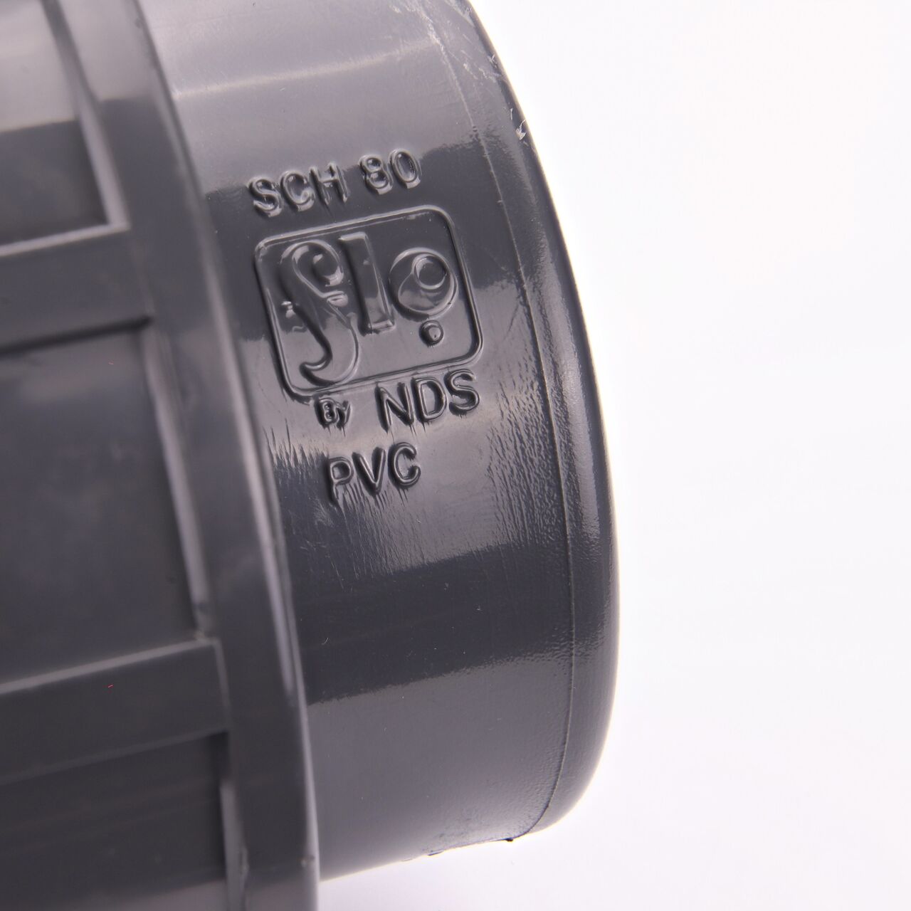 Closeup view of the size mark showing it is 2 in. FPT female connection point that makes a leak-resistant connection between pipes (NDS U-2000-ST)