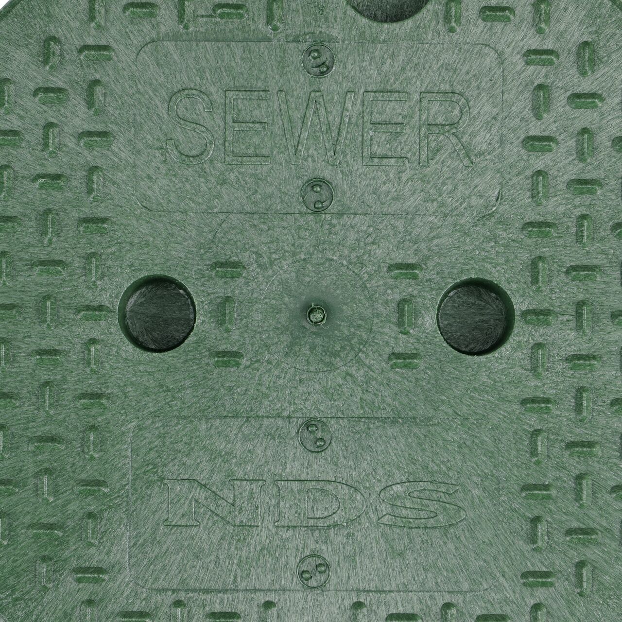Closeup view of the Sewer Markings on the Green Sewer cover for the NDS 10 in. Round Standard Series Valve Box (NDS 112BCS)