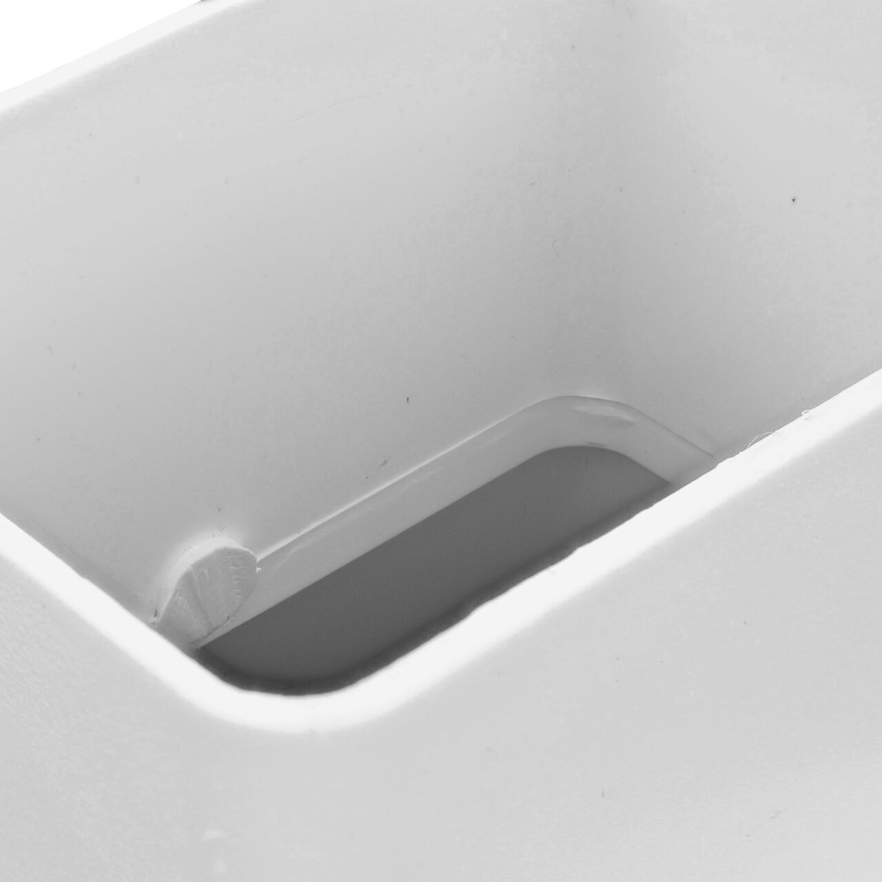 Closeup of the 2 x 3 rectangular end of the NDS PVC downspout adapter (NDS 9P08*, NDS 9P08)