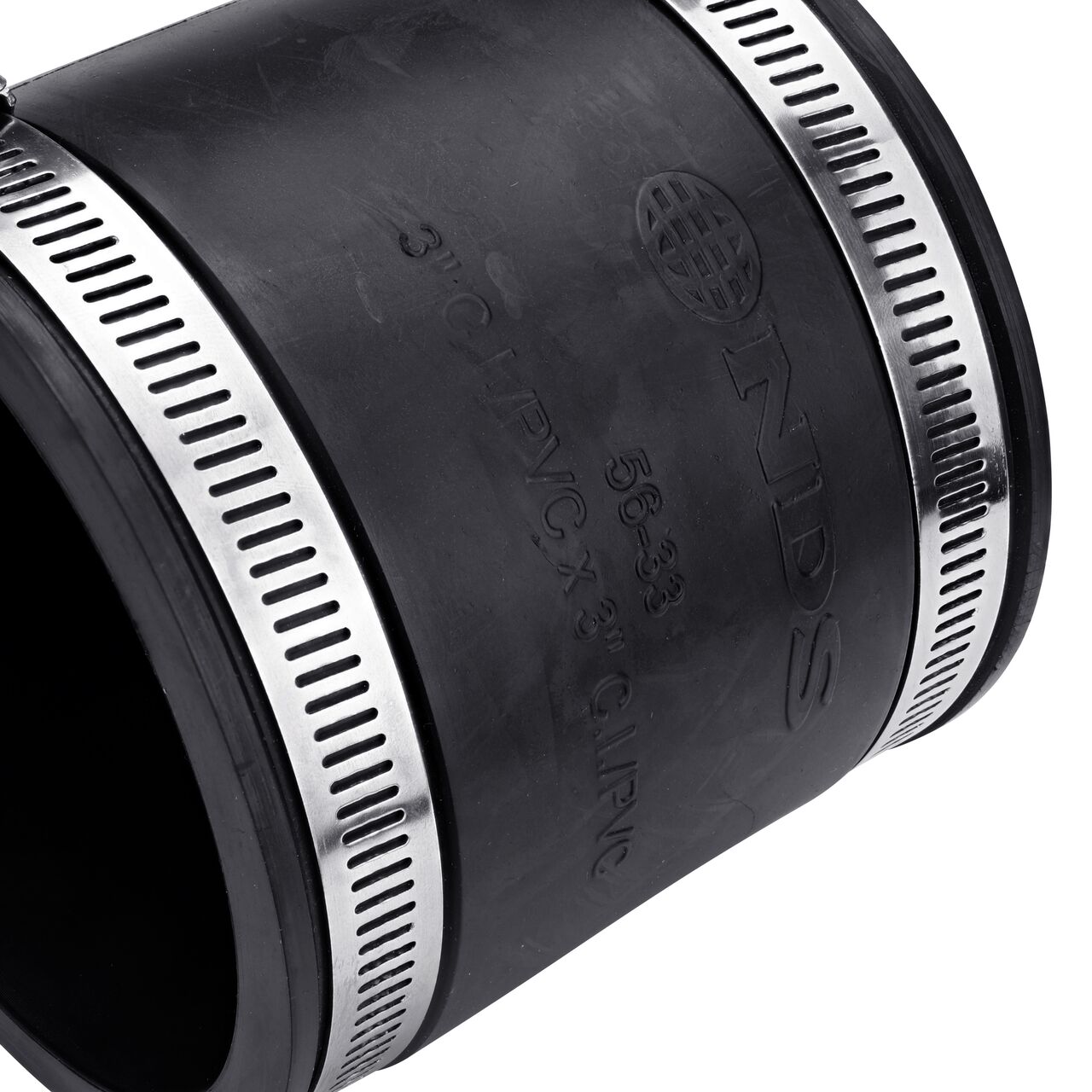 Closeup view of the NDS 3 in. flex coupling mark showing the size and compatible cast iron/sewer and drain or DWV/copper/steel/lead pipes eliminating guesswork on the job (NDS 56-33)