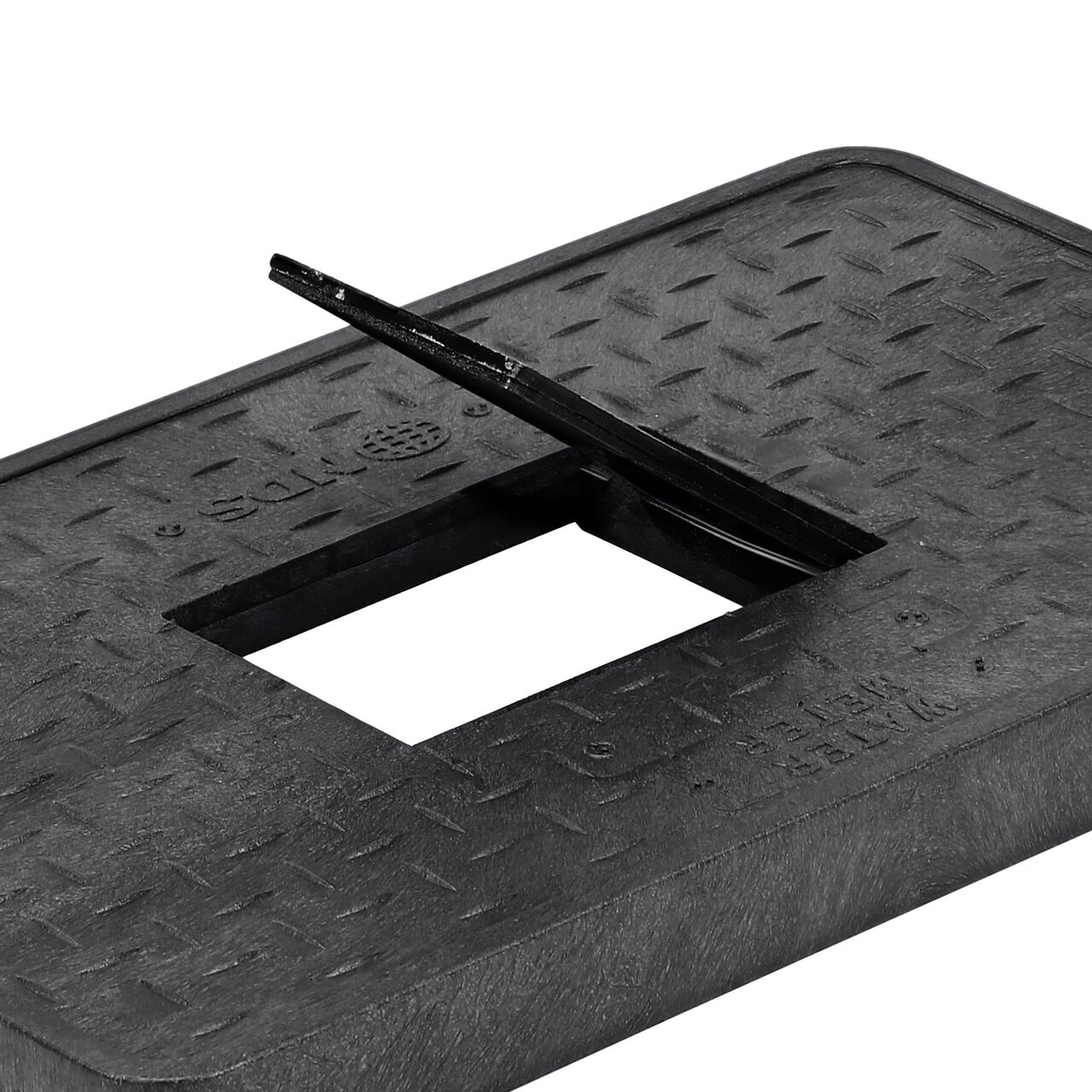 Close up view of the hinged side of the Cast Iron reader door on the Water Meter Black Drop-in 13 in. X 24 in. Rectangular Standard Series Meter Cover which allows for easy meter reading (NDS 121CDMCIF)