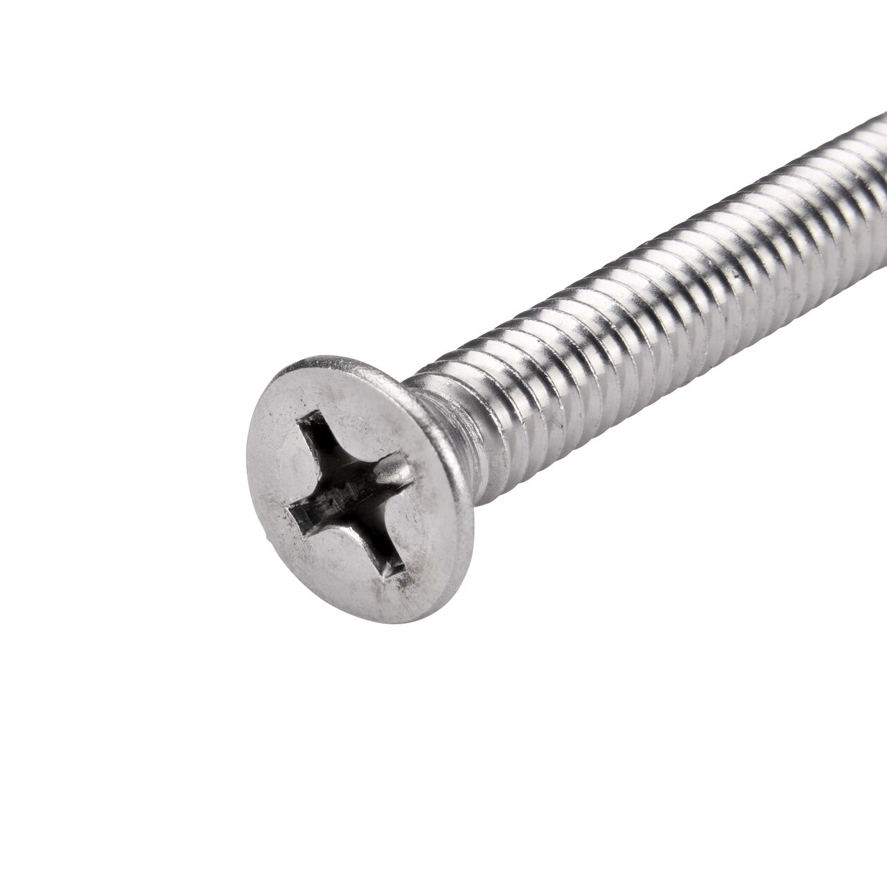Closeup of the flat head end on the 1/4 inch X 1-1/2 inch long flat head style Phillips Screw (NDS 629) which secures Dura Slope® Drainage Grates to the Dura Slope channel drains keeping grates in place to block debris from entering the drainage system