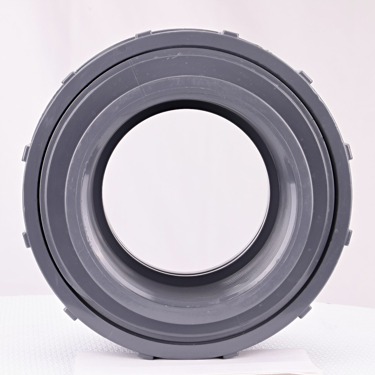 The inside of the threaded NDS 4 in. PVC Union which allows water to flow through while preventing leaks and made of durable PVC plastic (NDS U-4000-T)