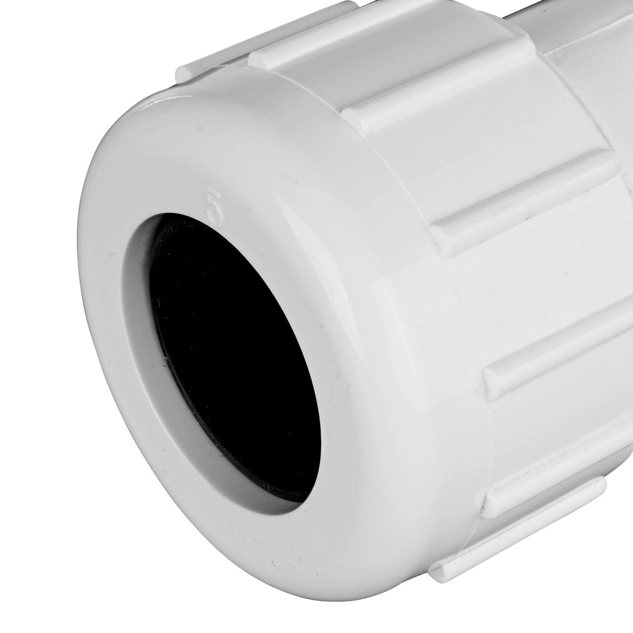 Closeup view of the NDS PVC Threaded Tees showing the compression end with 3/4 in. adjustable nuts that secured in place which reduces pull-out from pipe (NDS CPT-0750-S)