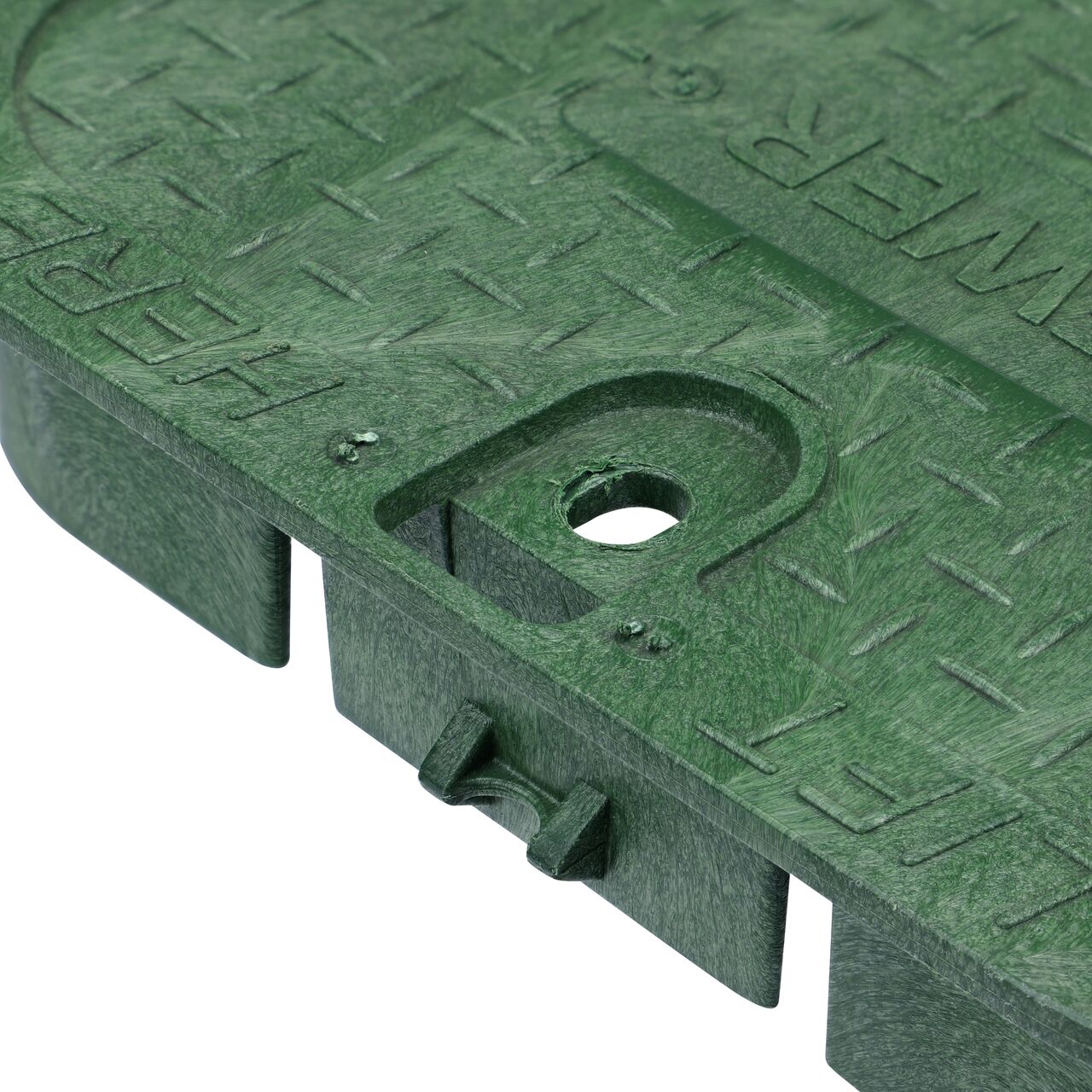 Closeup view of the locking mechanism and bolt hole on the Sewer Water cover (NDS 113CS) for the NDS 14 X 19 in. Rectangular Standard Series Valve Box
