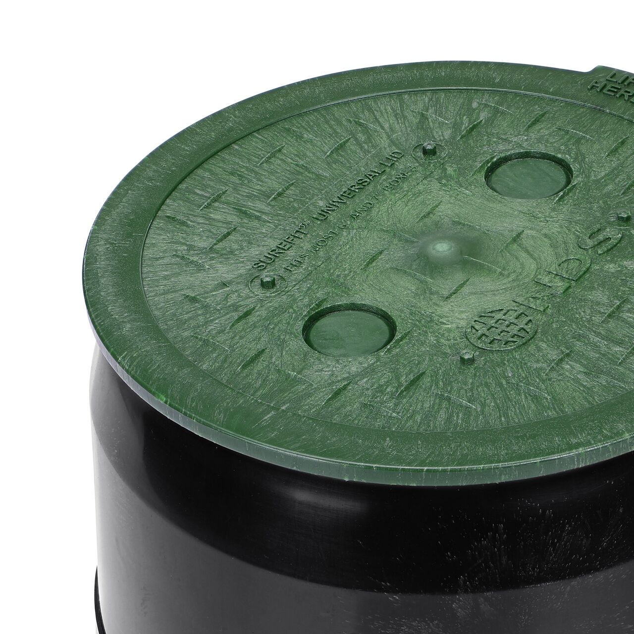 Closeup of the 6 in. Round SureFit Universal Valve Box Lid (NDS 6RND-UC) installed on a black 7 in. Ewing valve box