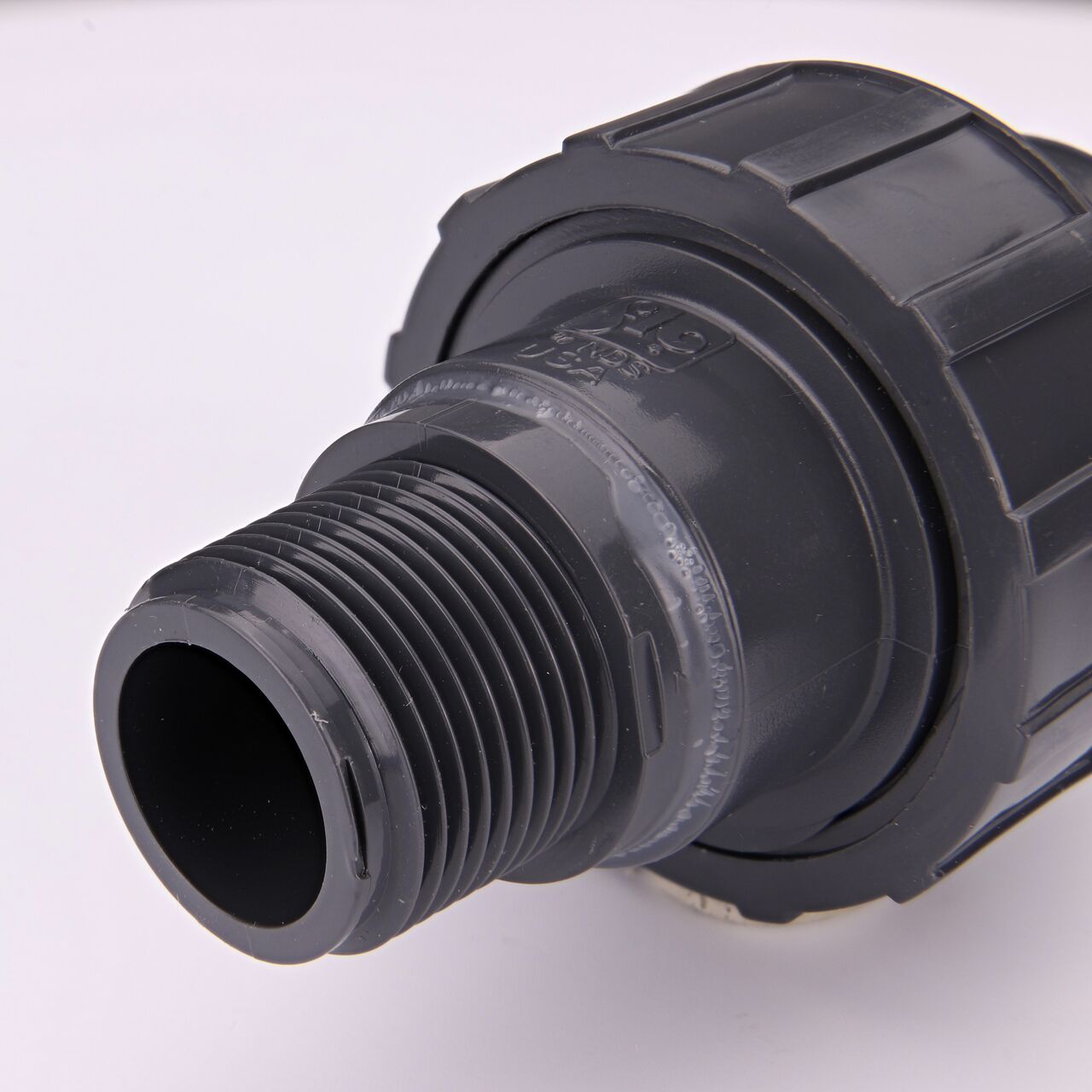 Closeup view of the threaded end on the NDS 3/4 in. PVC Union (NDS U-0750-SM)  which provides a corrosion-free connection between pipes and prevents costly property damage