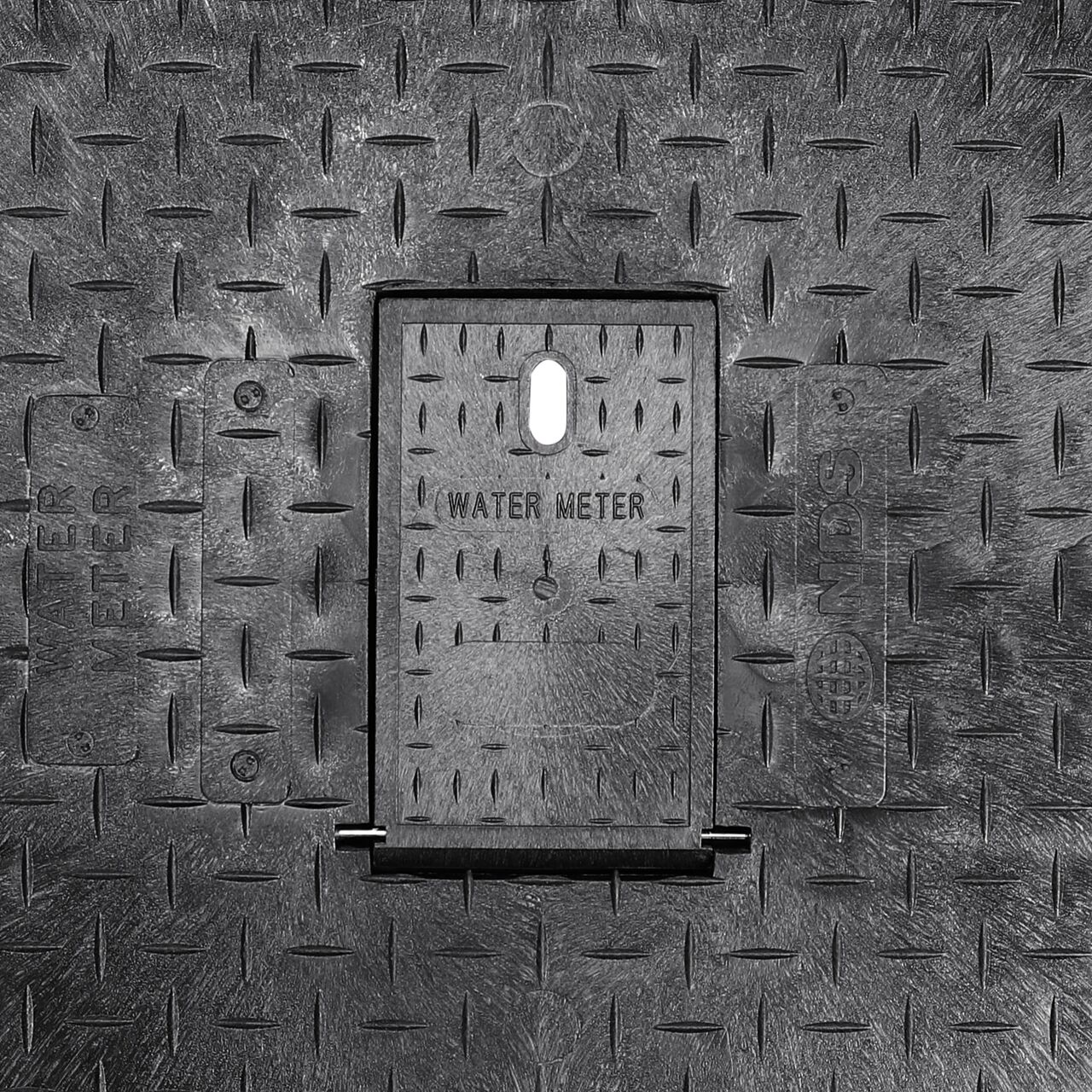 Closeup view of the latching system on the Black NDS 17 in. X 30 in. Rectangular Standard Series Meter Box (NDS 124BCDMB) for securing meter lid or cover to the meter box