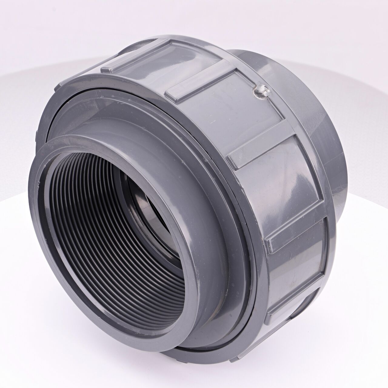 The NDS 4 in. PVC FPT Union connects two 4 in. schedule 80 pipes with MPT ends to create a leak-resistant connection without the need for traditional glued sealant (NDS U-4000-T)