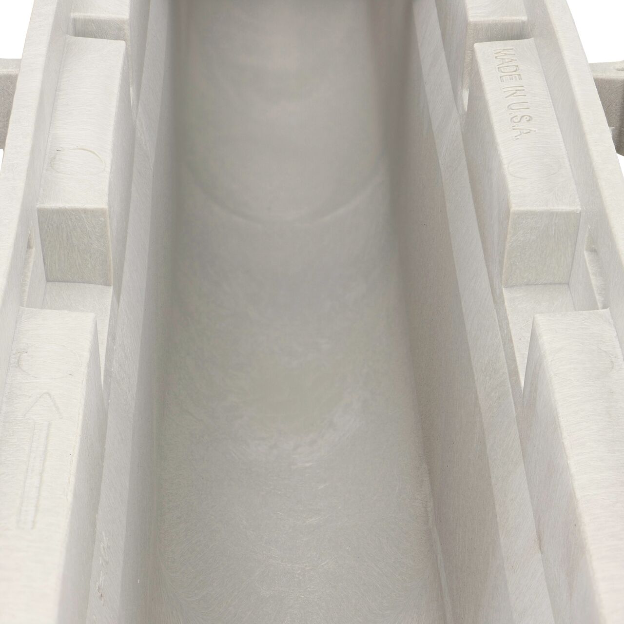 Closeup view of the grooved interior on the NDS Dura Slope Channel Drain, which supports and secures grates with the grate locking system (NDS DS-103N, NDS DS-104, NDS DS-105, NDS DS-106)