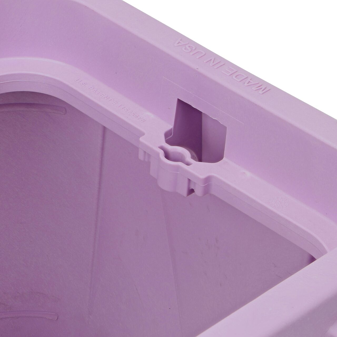 Closeup view of the bolt hole on the Purple NDS 14 in. x 19 in. Rectangular Pro-Spec® Series Valve Box (NDS 314PBCBR) for securing valve lid or cover to the valve box